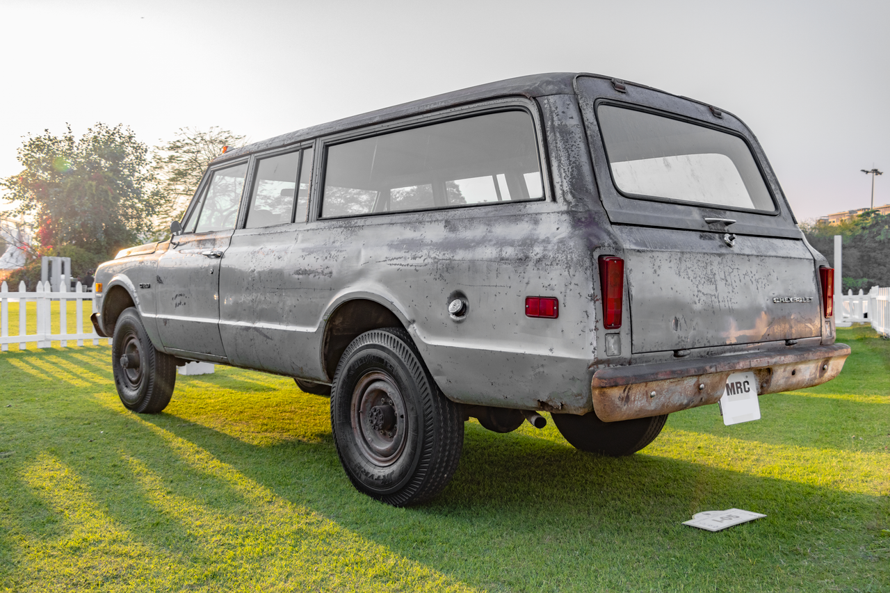 hero-img-02 Classic Chevrolet Suburban C10 displayed outdoors in Gurugram. Perfect for car enthusiasts.